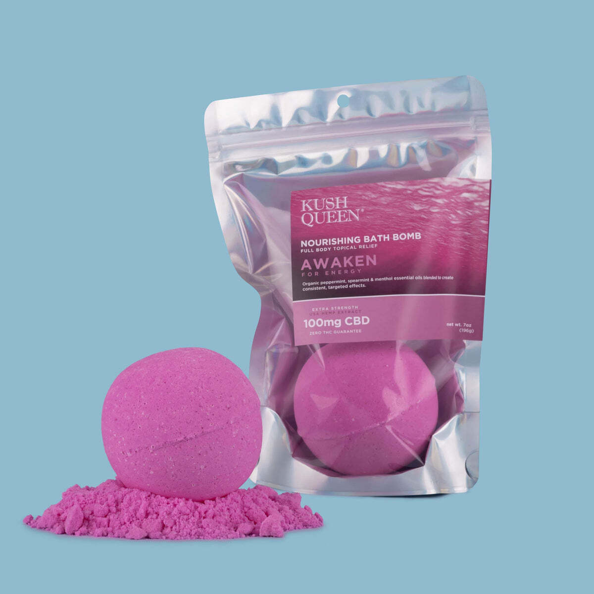 Purple Kush Queen nourishing bath bomb with 100mg CBD displayed beside its resealable packaging on a blue background.