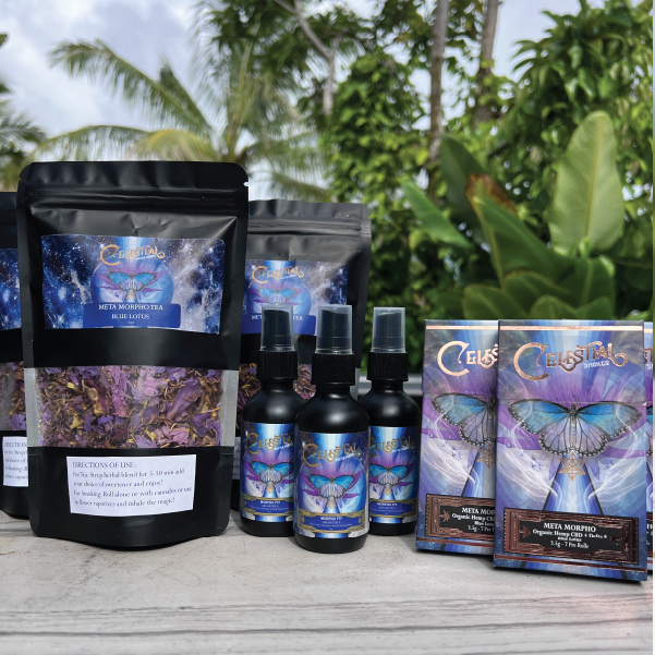 Celestial-branded herbal products including Meta Morpho tea, spray bottles, and pre-rolls displayed on a table with tropical greenery in the background.