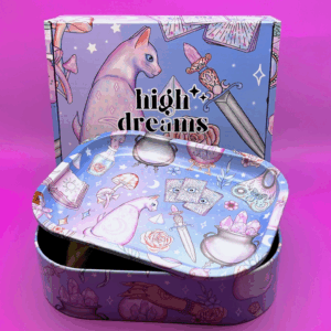 A decorative metal tray and box set featuring mystical illustrations of a cat, tarot cards, crystals, mushrooms, and magical symbols with the words 'high dreams' on the box