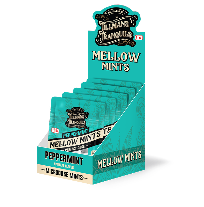 A display box containing multiple packs of Tillmans Tranquils Mellow Mints in peppermint flavor