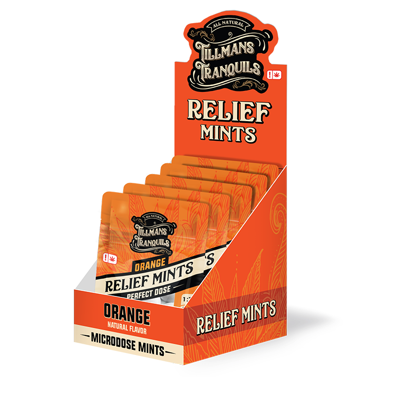 Orange-flavored Tillmans Tranquils Relief Mints in a display box labeled 'Microdose Mints